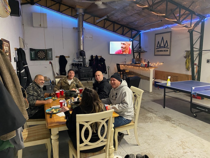 Group of people enjoying a meal.